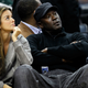 Michael Jordan with fiancée Yvette Prieto during a Bobcats game(Streeter Lecka/Getty Images)